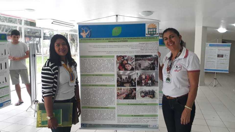 Aluna e professora participam do evento 